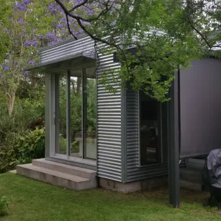 The addition provides a seamless link between the interior and garden