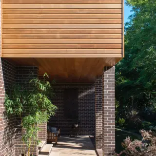 The entrance opens onto the lower terrace
