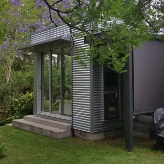 The new addition sits comfortably within the garden