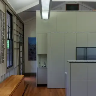 Cabinetry showing emphasises the volume of the school room