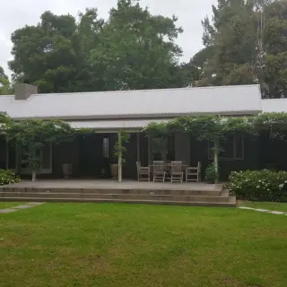 The verandah decking extending beyond the roof